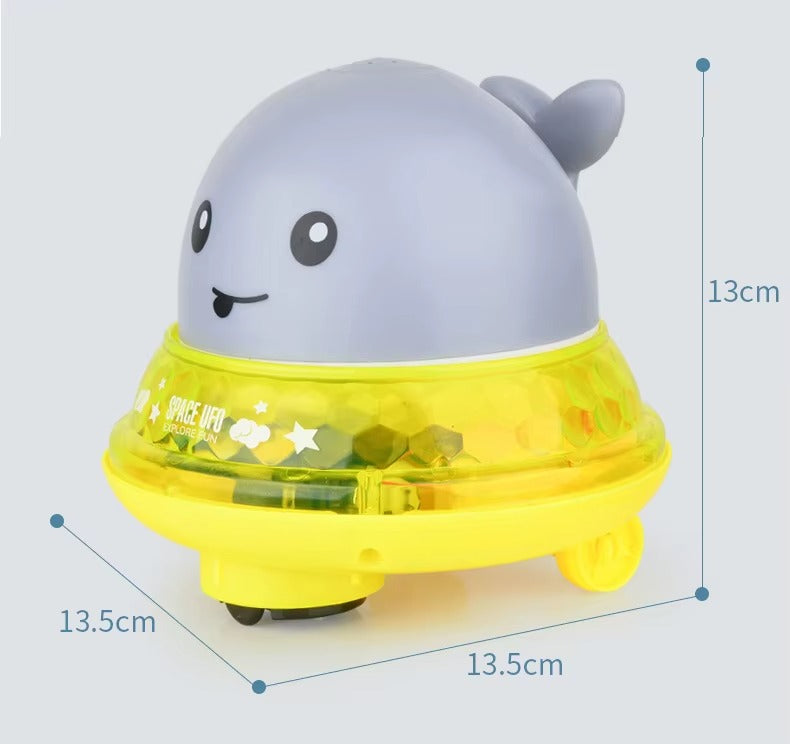 Toy with a whale design, showing dimensions on a light gray background