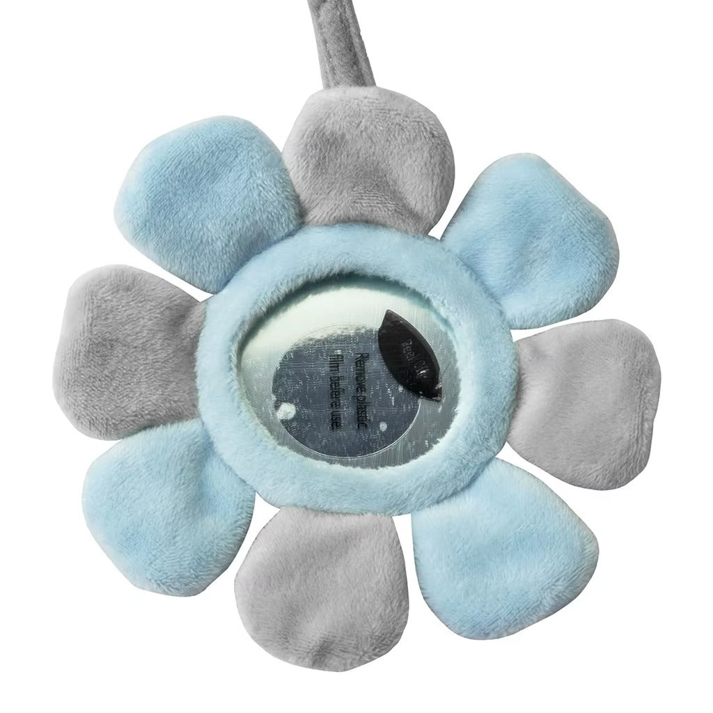 Flower-shaped mirror with blue and gray petals on a white background