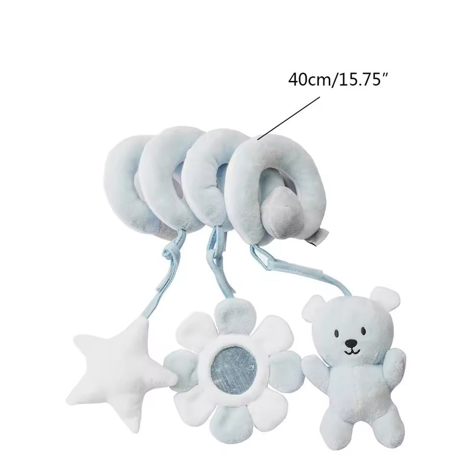 Baby rattle toy with plush elements and measurement label on a white background