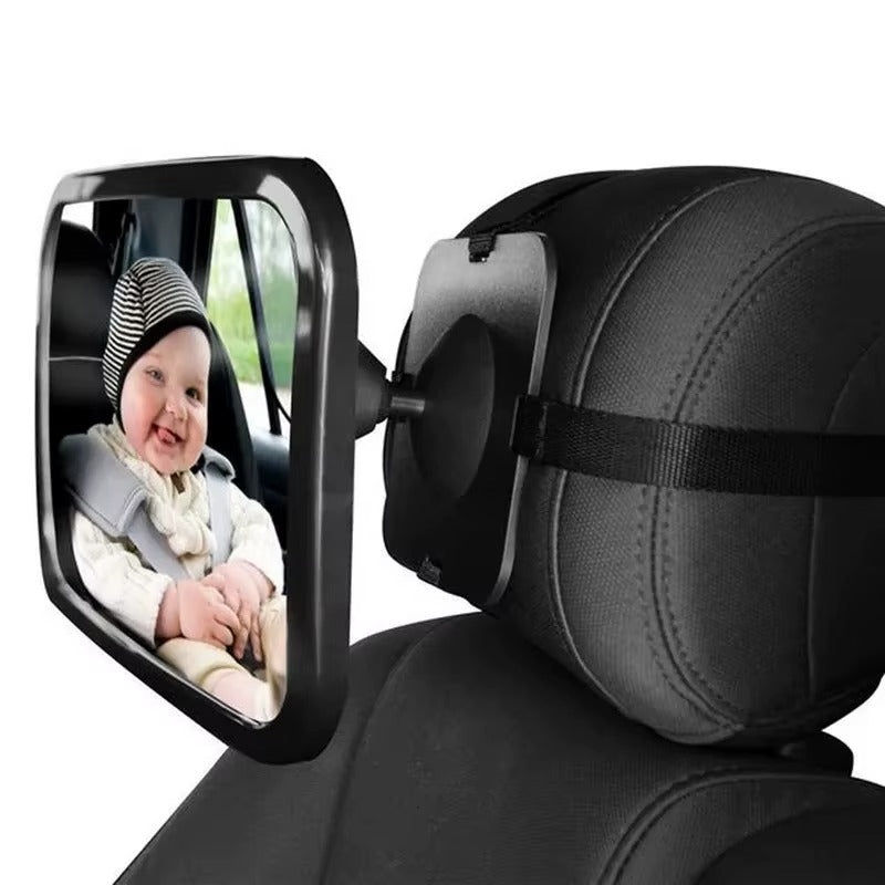 Car seat safety mirror showing a baby in a car seat