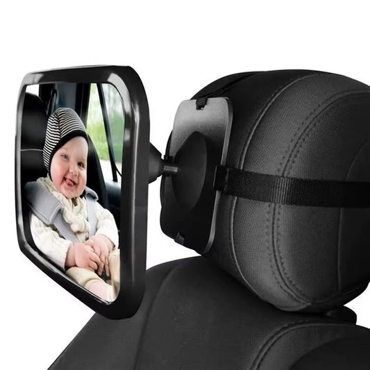 Car seat safety mirror showing a baby in a car seat